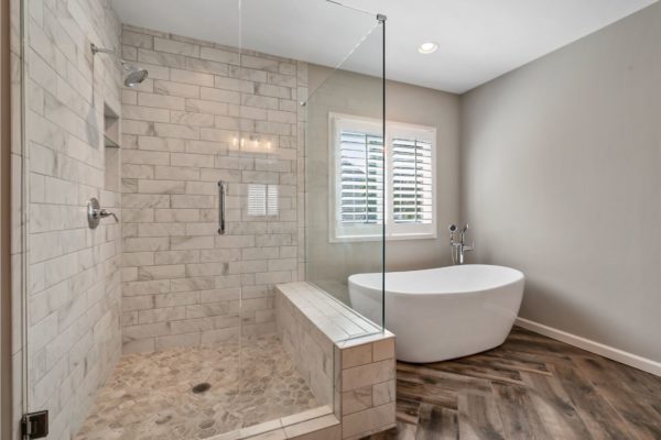 Large custom shower, and free standing tub.