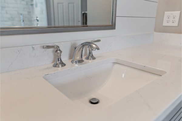 Beautiful quartz countertop with undermount vanity sink.