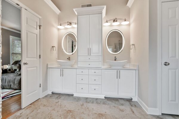 Custom vanity cabinets with linen tower.
