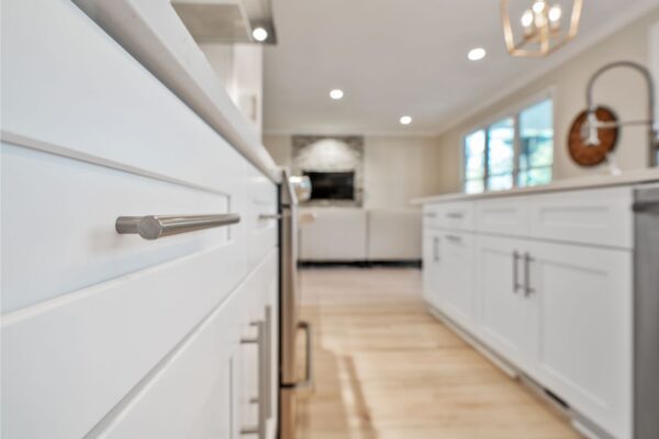 Shaker style cabinets with satin nickel cabinet pulls.