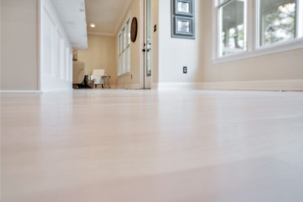 Kitchen remodel with refinished hardwood floors.